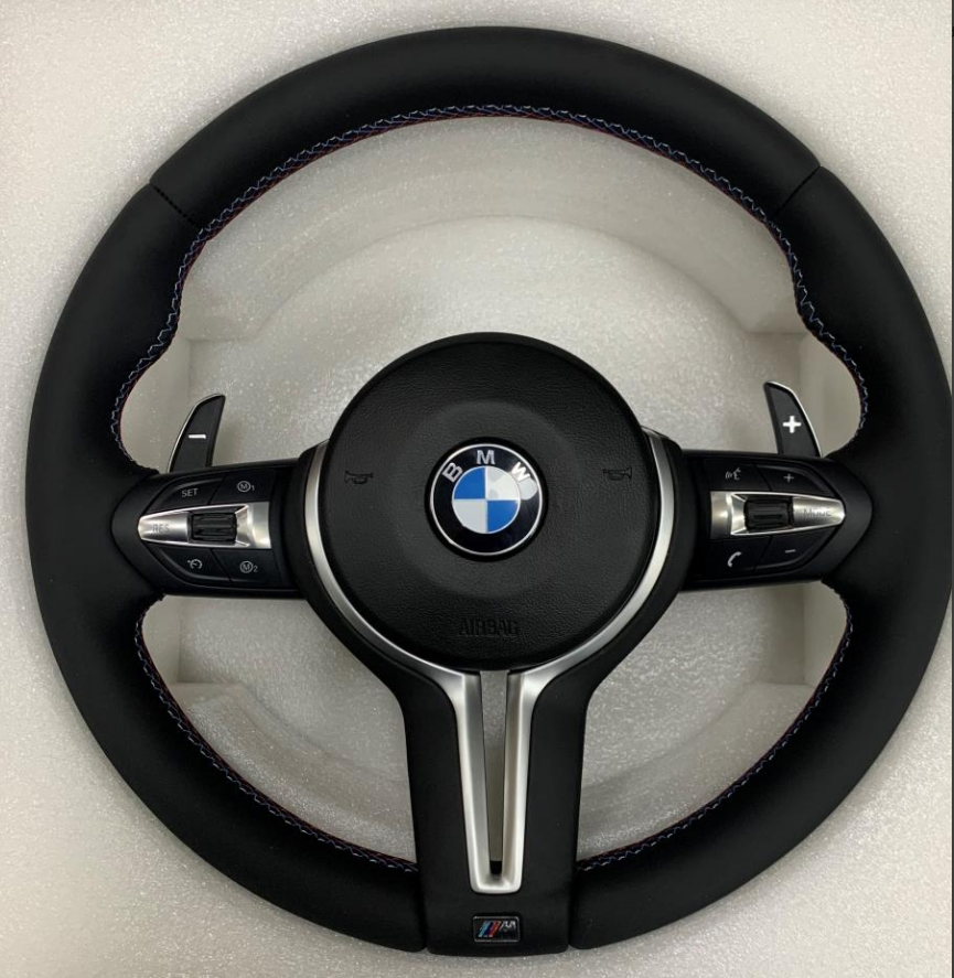 Volante BMW E Series — Cuero